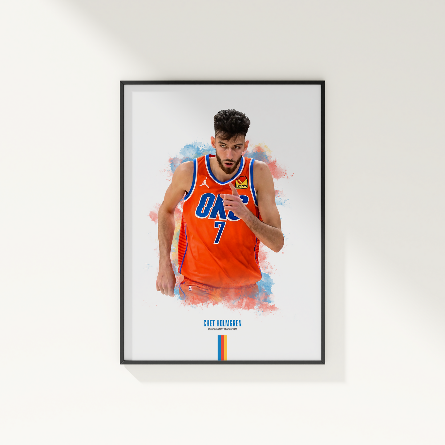 Framed poster of basketball player Chet Holmgren wearing a Thunder jersey on a white wall.