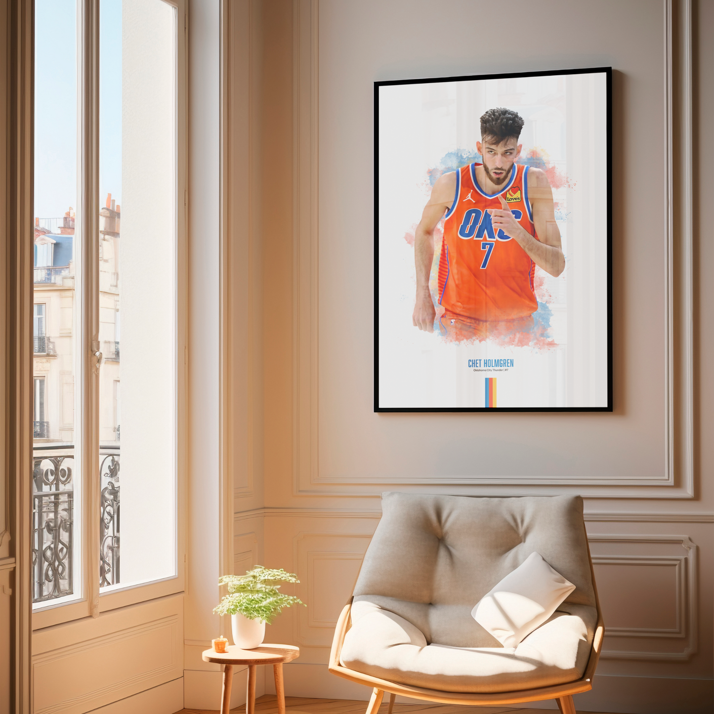 Framed poster of basketball player Chet Holmgren wearing a Thunder jersey on a wall above a chair.