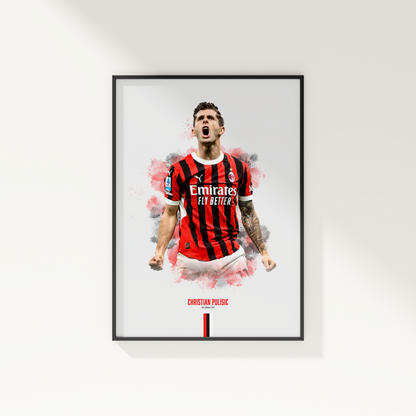 Framed poster print of soccer player Christian Pulisic, wearing an AC Milan jersey, on a white wall.