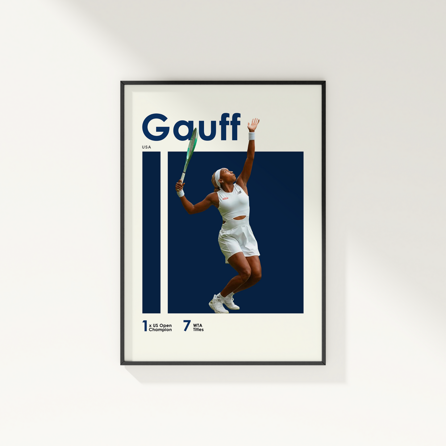 framed poster mockup of tennis player coco gauff hanging on a white wall