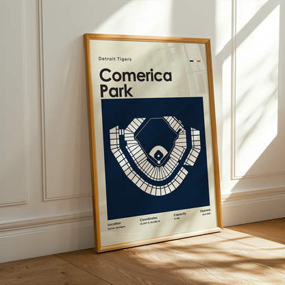 Poster of Comerica Park with Detroit Tigers branding in a wooden frame on a wall.