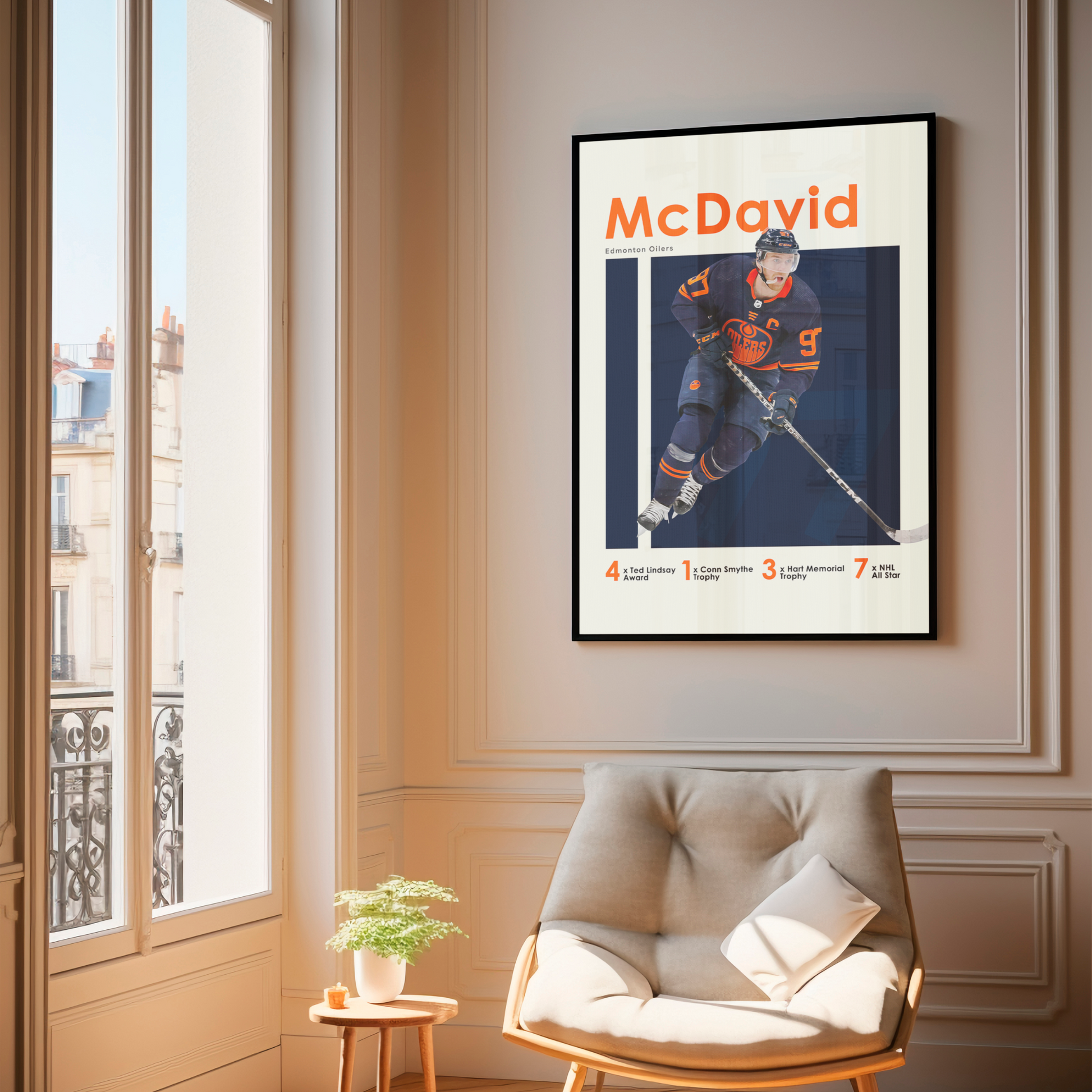 framed poster mockup of hockey player connor mcdavid hanging in a living room