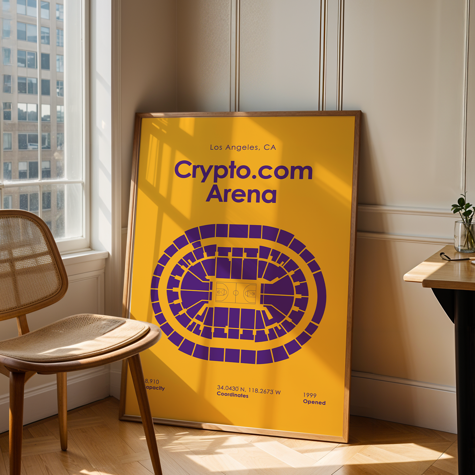 Poster of Crypto.com Arena in a room with a chair and table.