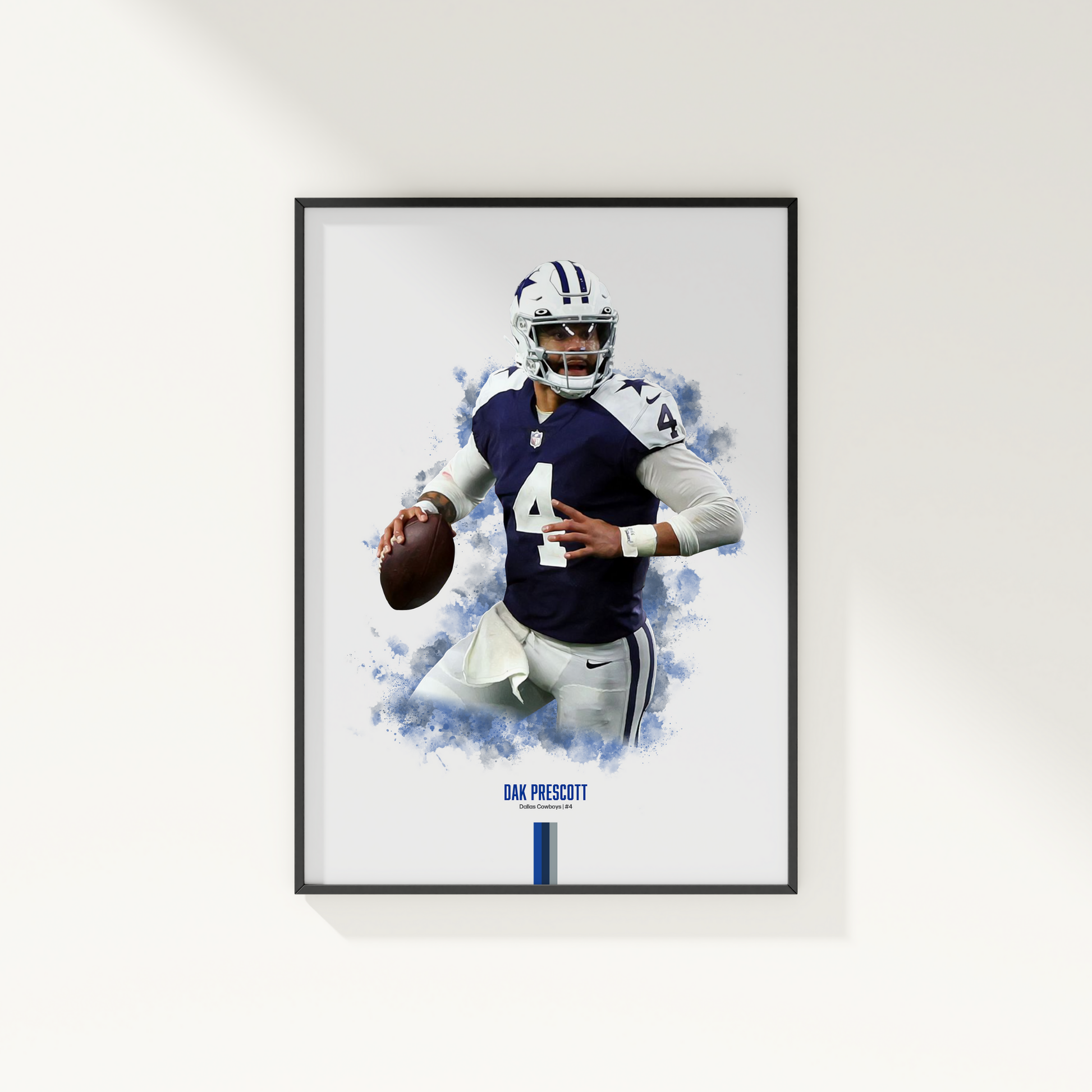 framed poster mockup of football player dak prescott hanging on a white wall