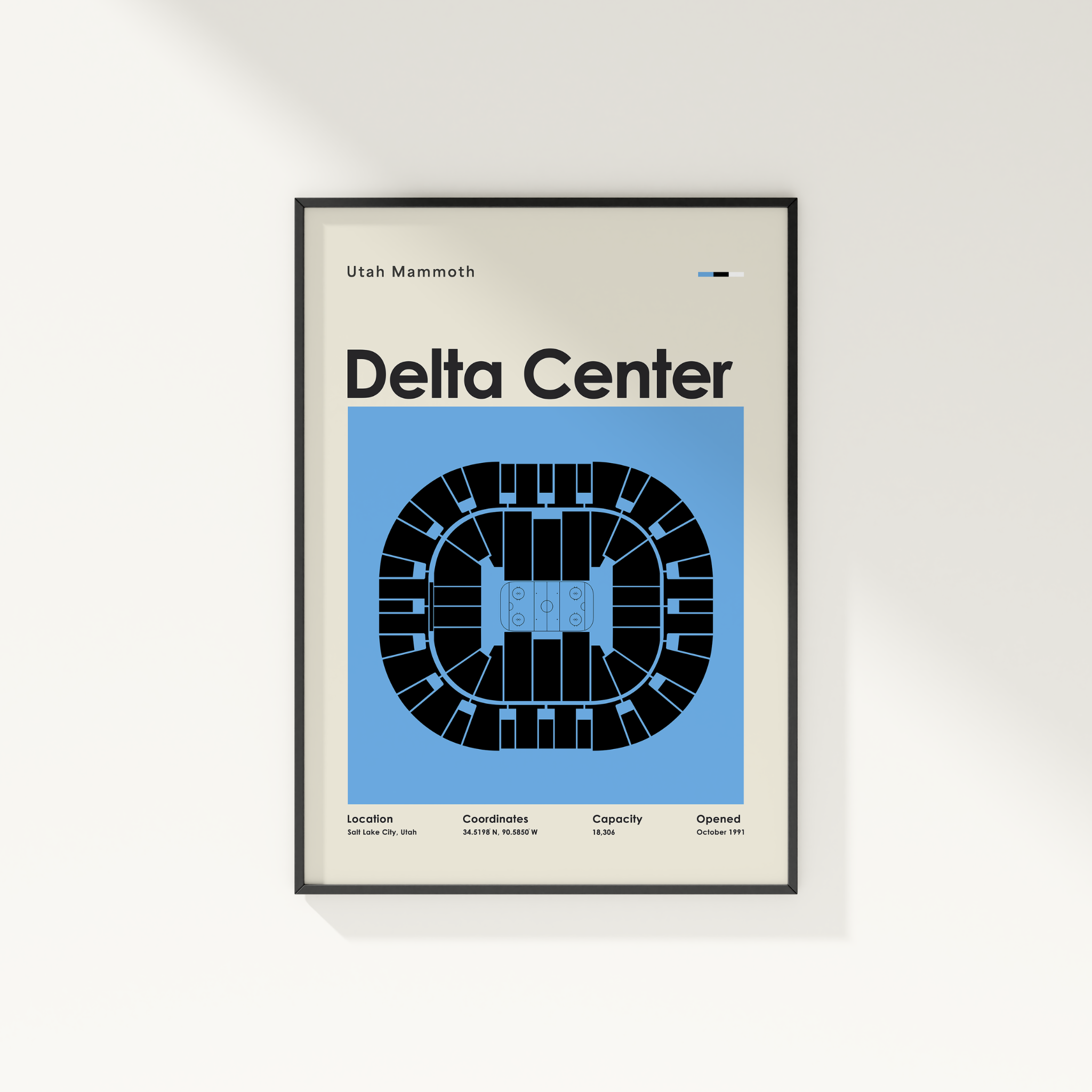 Framed poster of Delta Center layout with Utah Mammoth text on a white wall.