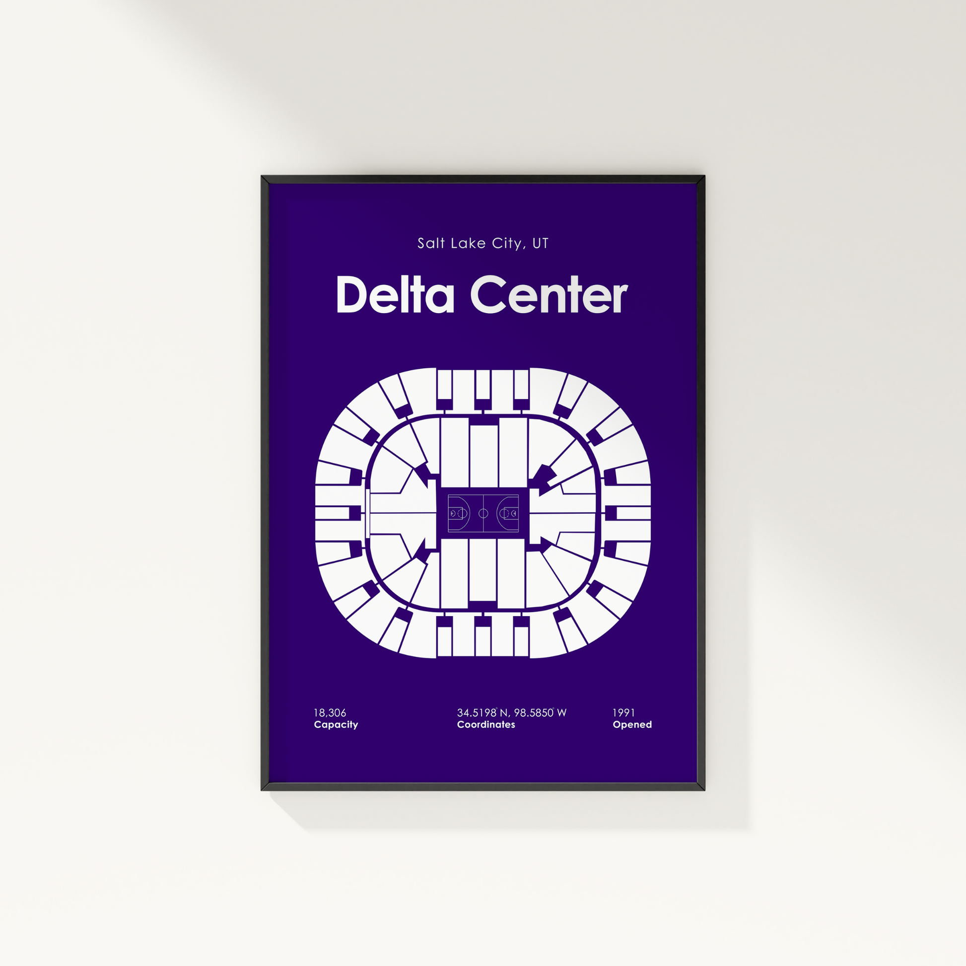Framed poster of Delta Center layout with text on a white wall