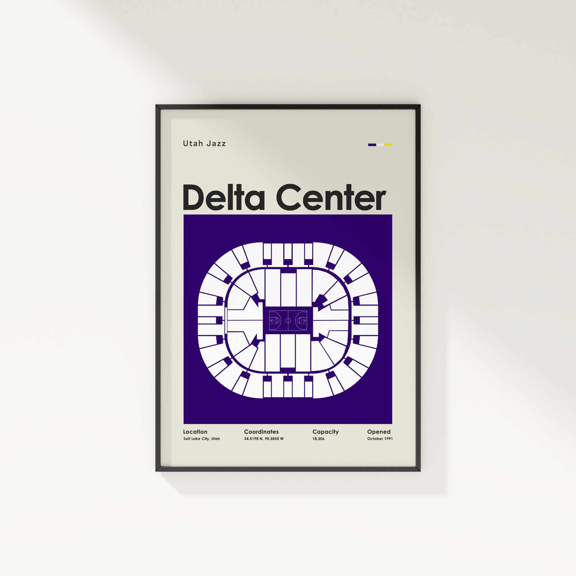 Framed poster of Delta Center layout with Utah Jazz branding on a white wall.