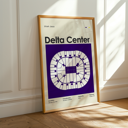 Framed poster of Delta Center in Utah Jazz branding on a wall.