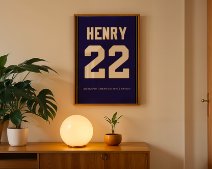 Framed jersey with 'HENRY 22' on a wall above a wooden cabinet with decorative items.