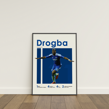 framed poster mockup of soccer player didier drogba leaning on a white wall