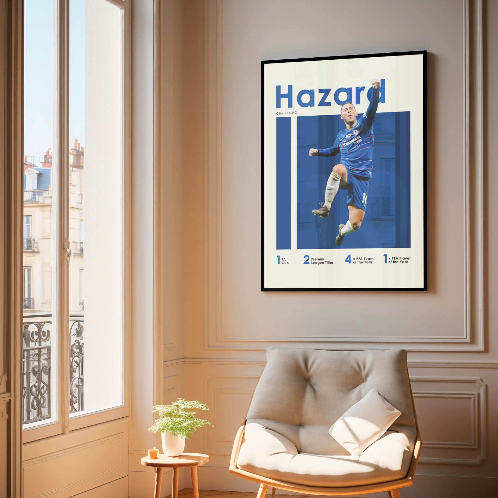 framed poster mockup of soccer player eden hazard hanging in a living room