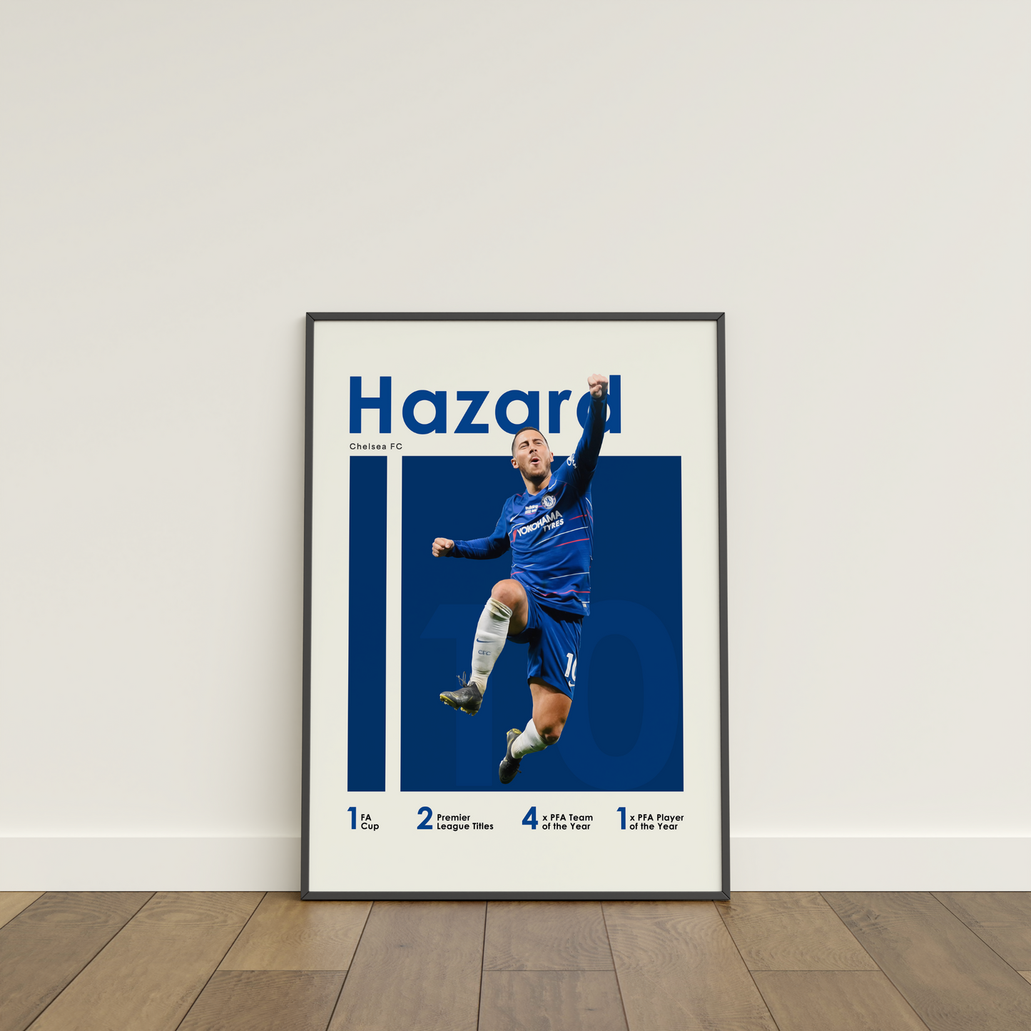 framed poster mockup of soccer player eden hazard leaning on a white wall