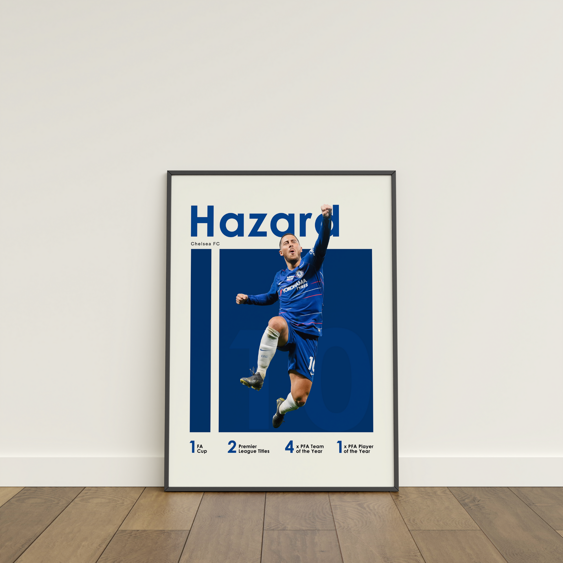 framed poster mockup of soccer player eden hazard leaning on a white wall