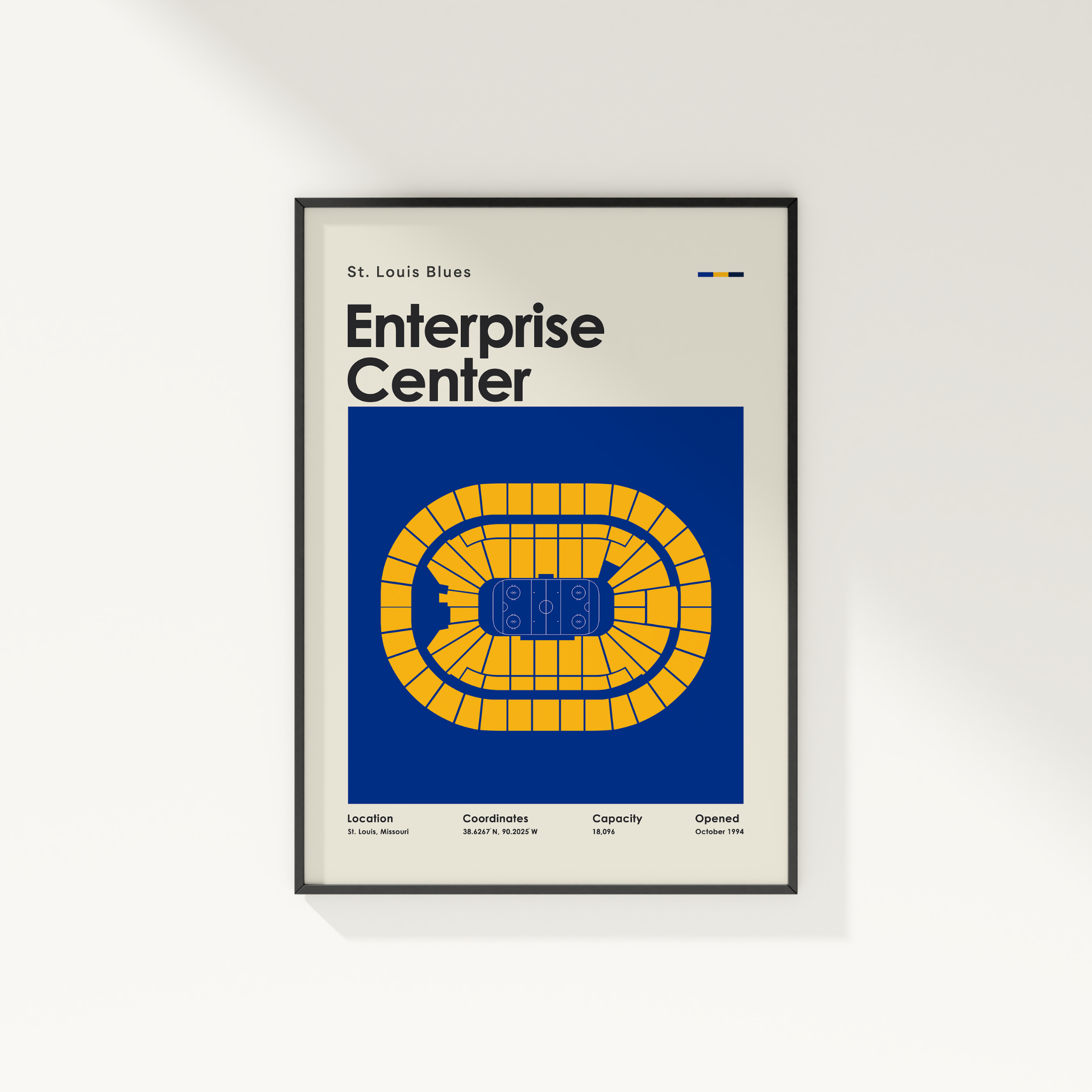 Framed poster of the Enterprise Center with seating chart design on a white background