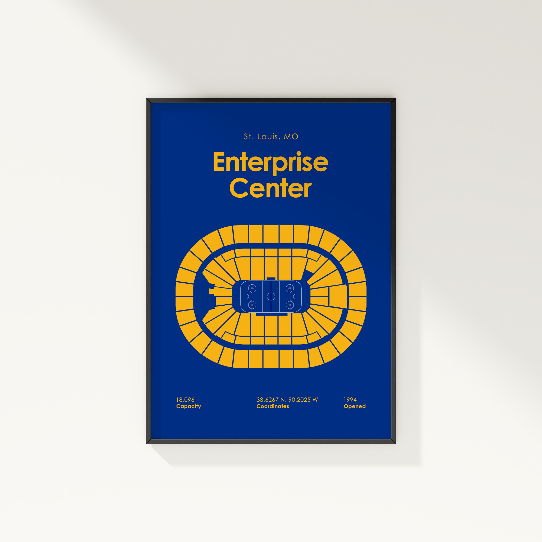 Framed poster of the Enterprise Center in St. Louis, MO with blue background and yellow seating chart.