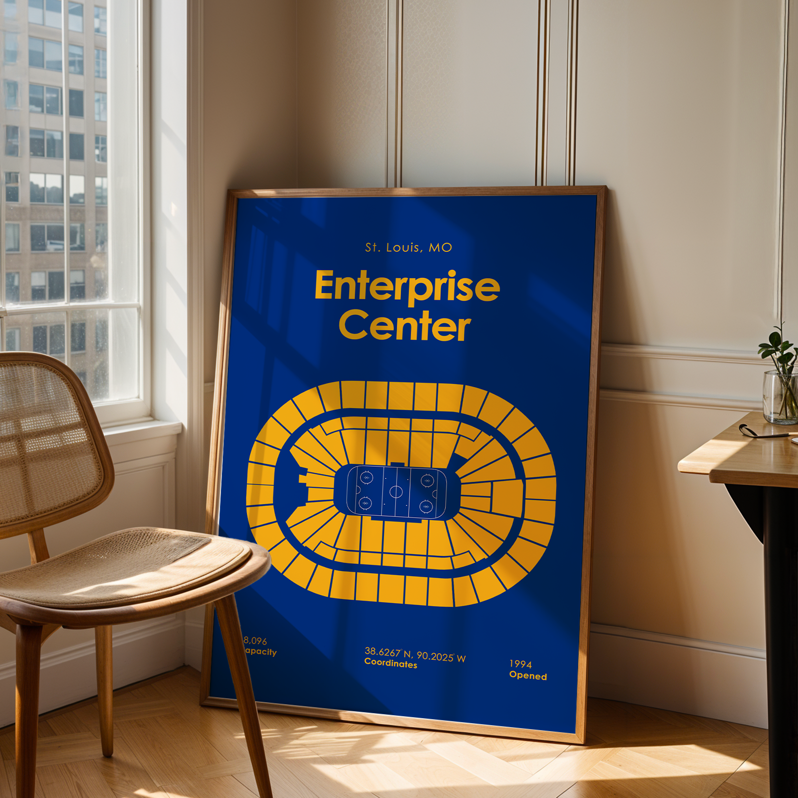 Poster of Enterprise Center in a room with a chair and window