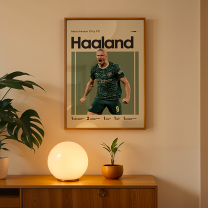 Framed poster of a soccer player with 'Haaland' on a wall above a wooden cabinet with decorative items.
