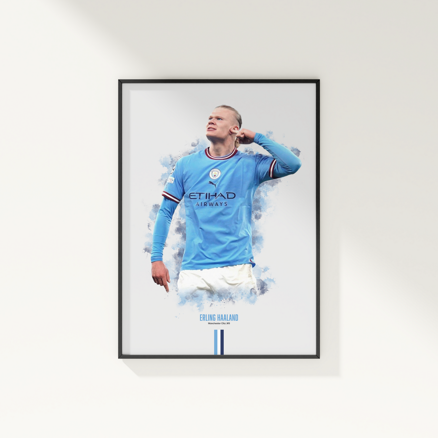 framed poster mockup of soccer player erling haaland hanging on a white wall