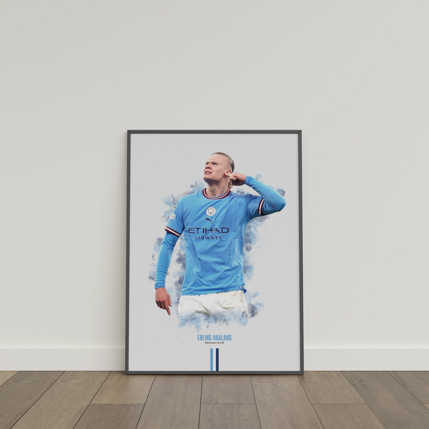 framed poster mockup of soccer player erling haaland leaning on a white wall