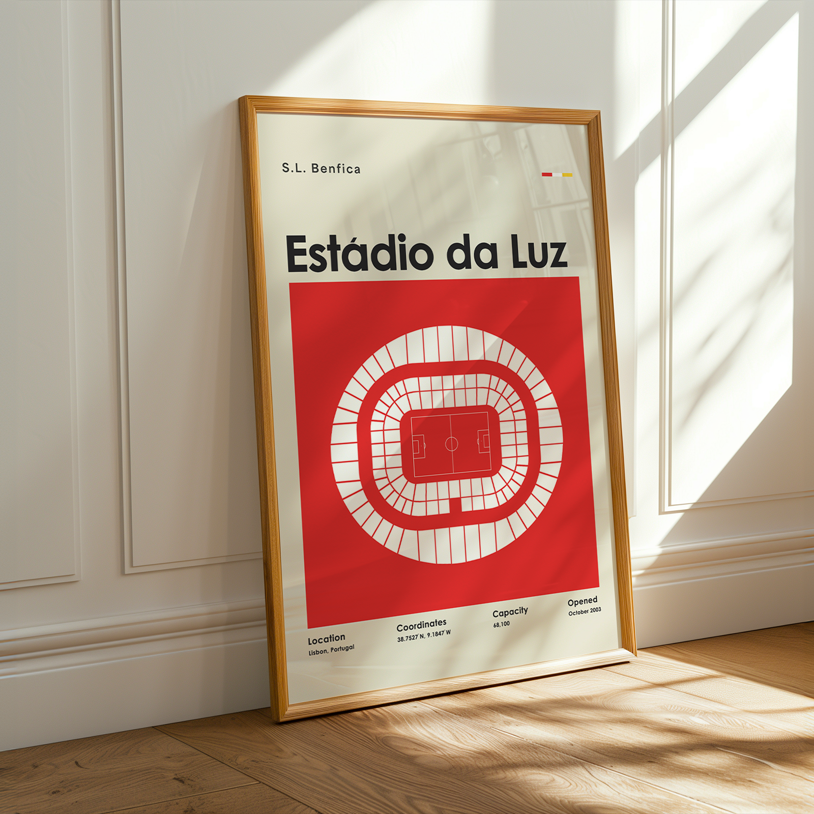 A framed sports poster of S.L. Benfica's stadium estadio da luz.