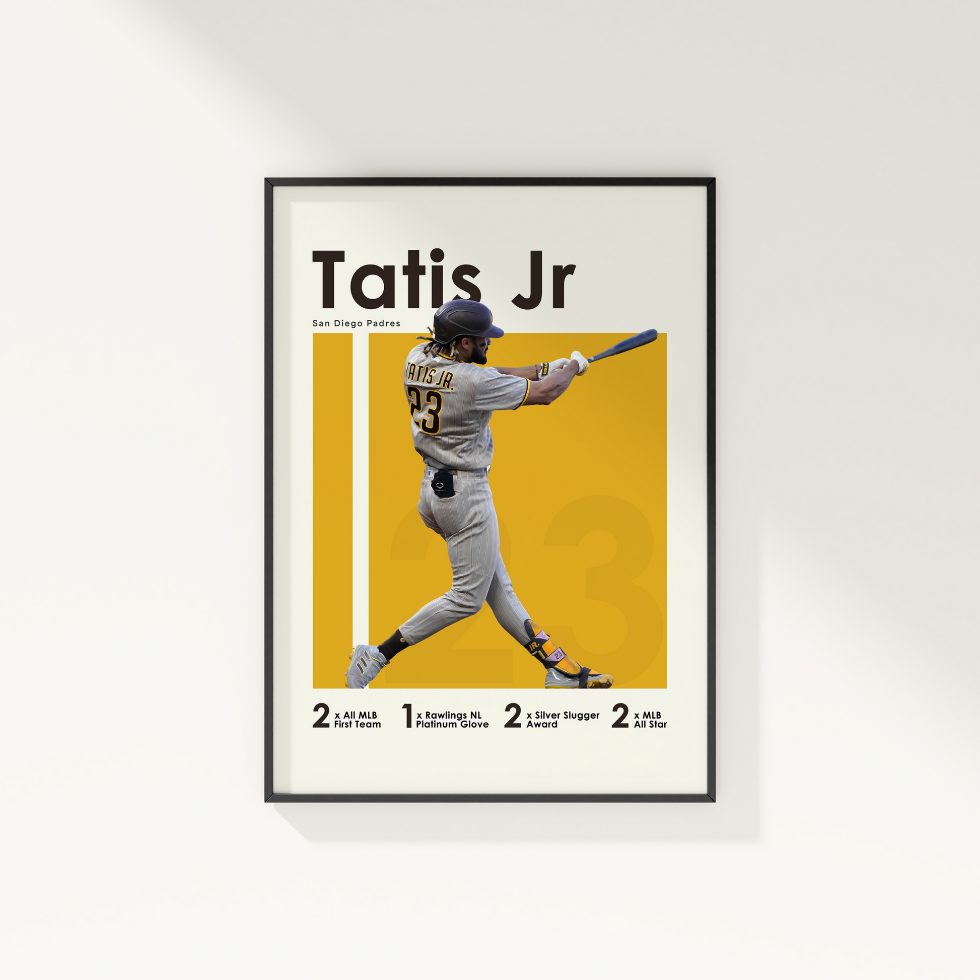 framed poster mockup of baseball player fernando tatis jr hanging on a white wall