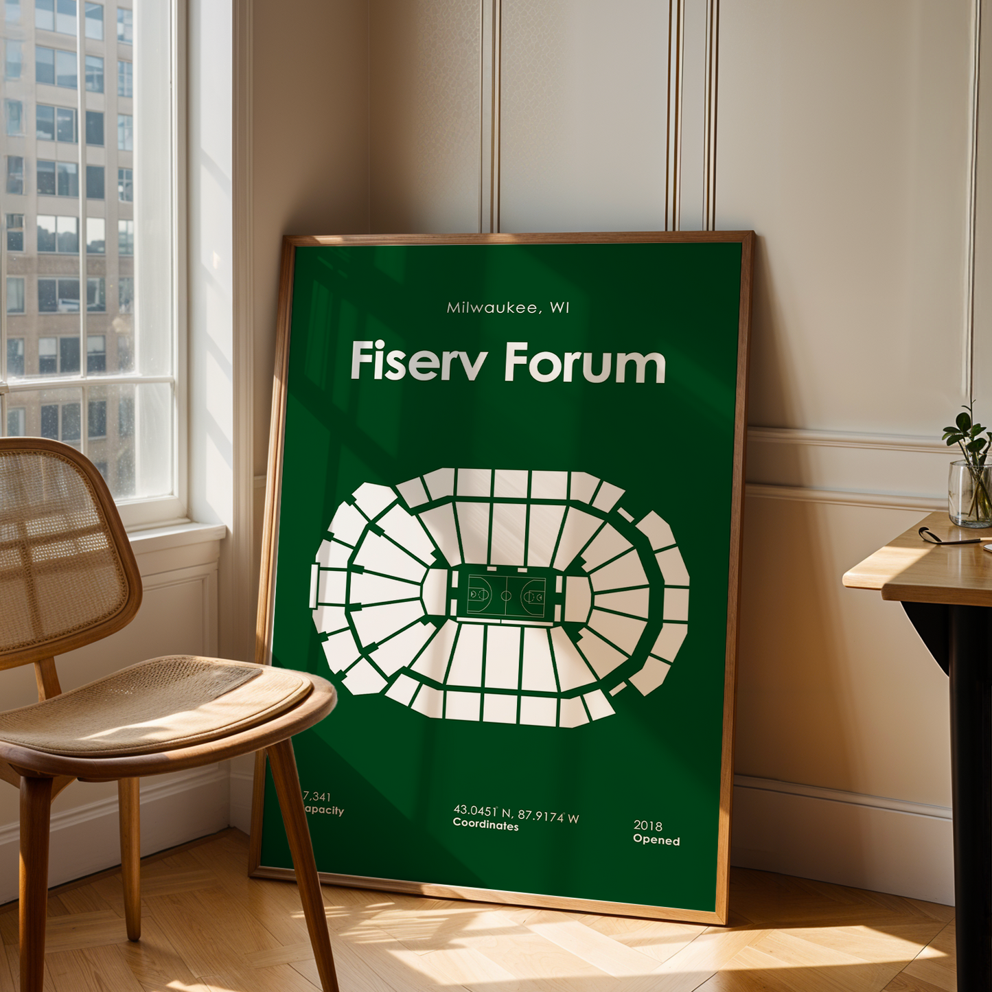 Fiserv Forum poster in a room with a chair and table