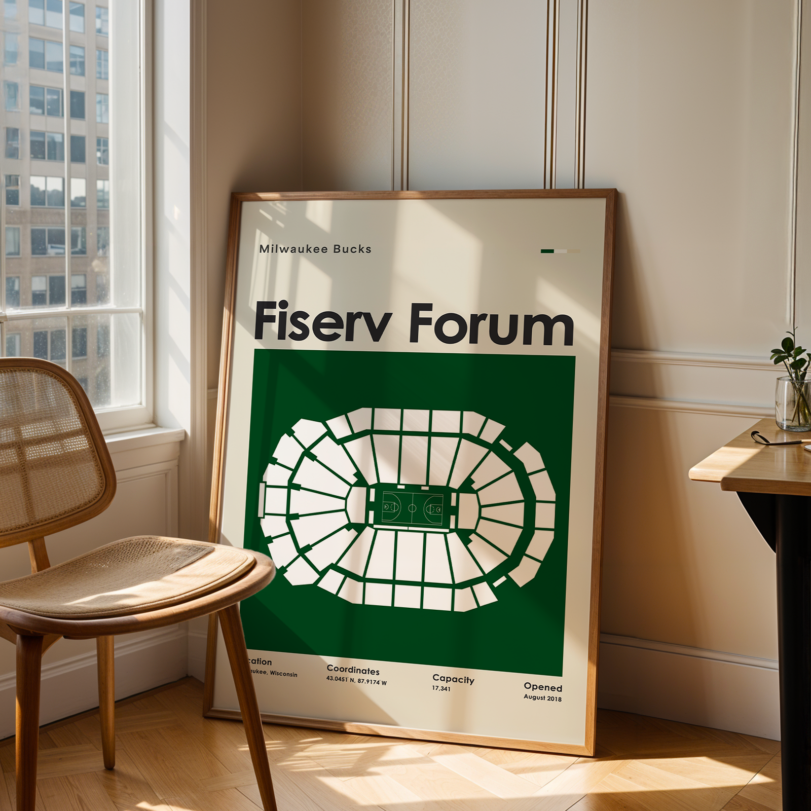 Fiserv Forum poster in a room with a chair and table