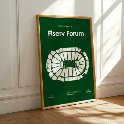 Fiserv Forum poster with seating chart design on a green background, framed in gold, leaning against a white wall.