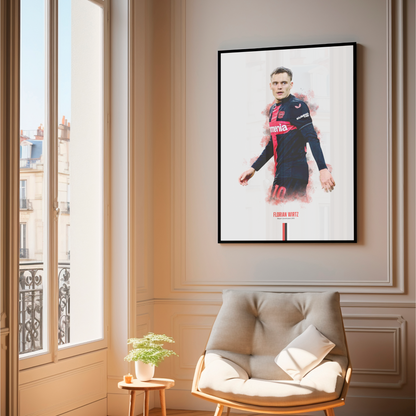 framed poster mockup of soccer player florian wirtz hanging in a living room