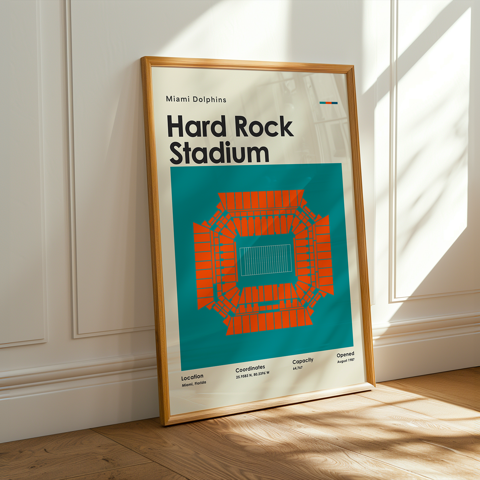 Framed poster of Miami Dolphins Hard Rock Stadium design on a wall.