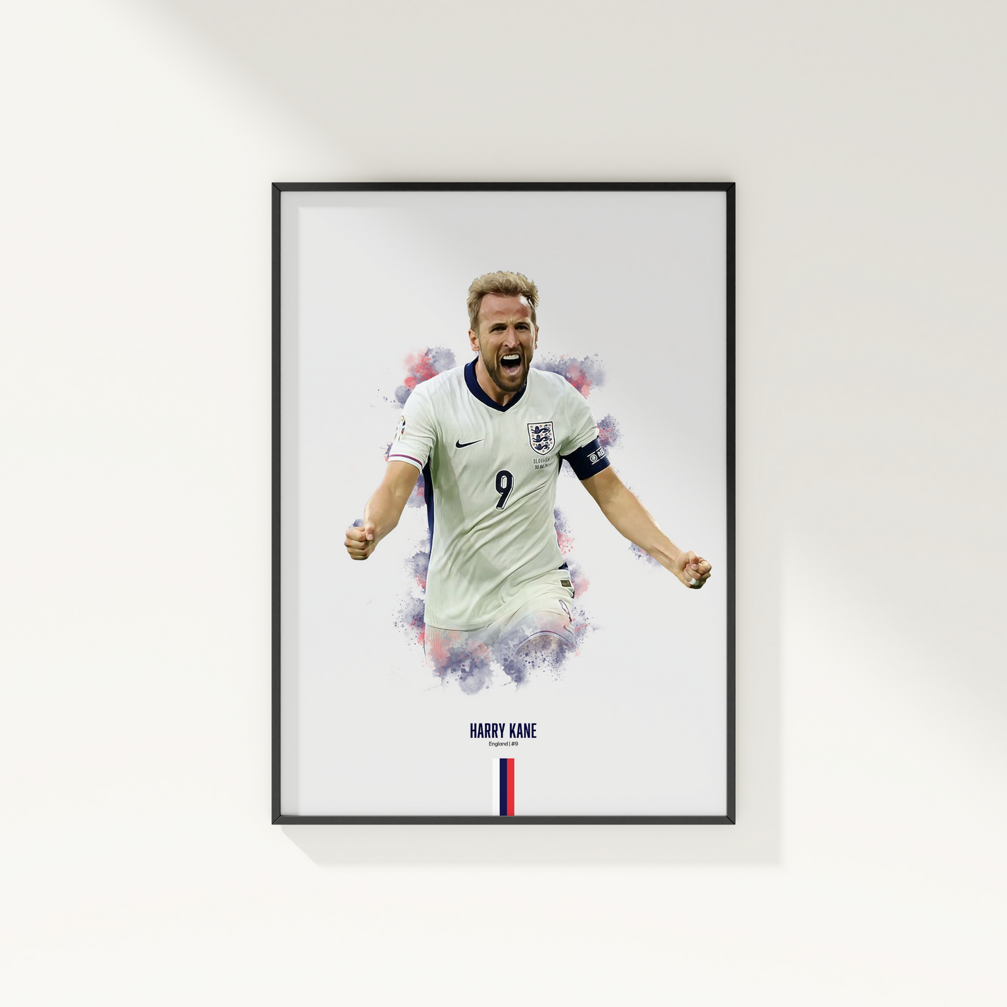 framed poster mockup of soccer player harry kane hanging on a white wall