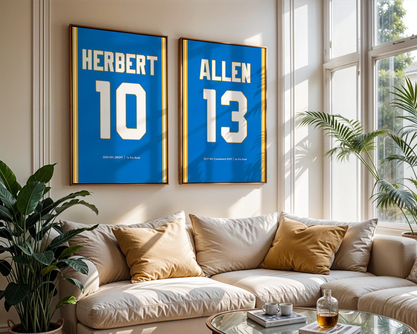 Two framed sports jerseys with names and numbers on a wall above a sofa.