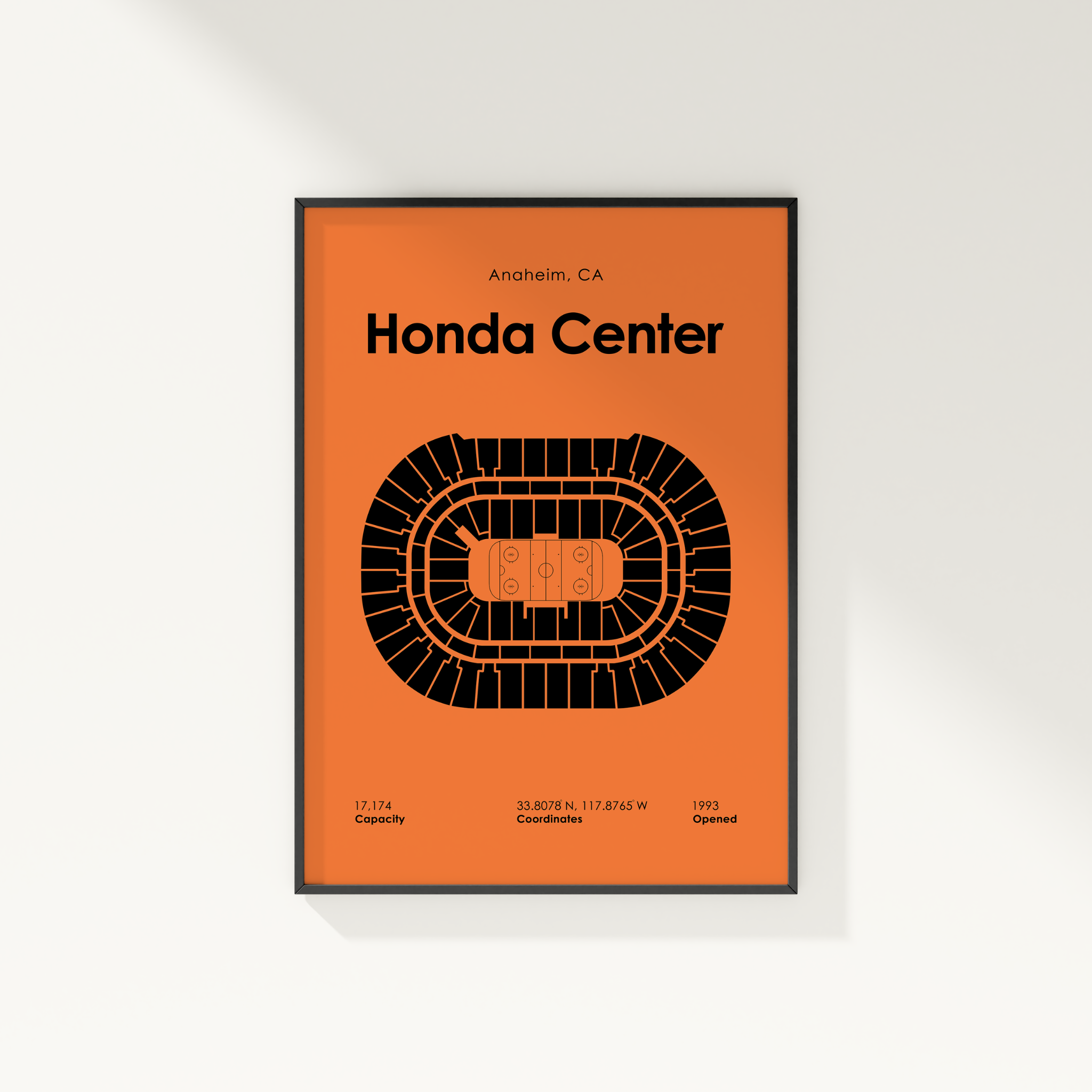 Framed poster of Honda Center layout on an orange background