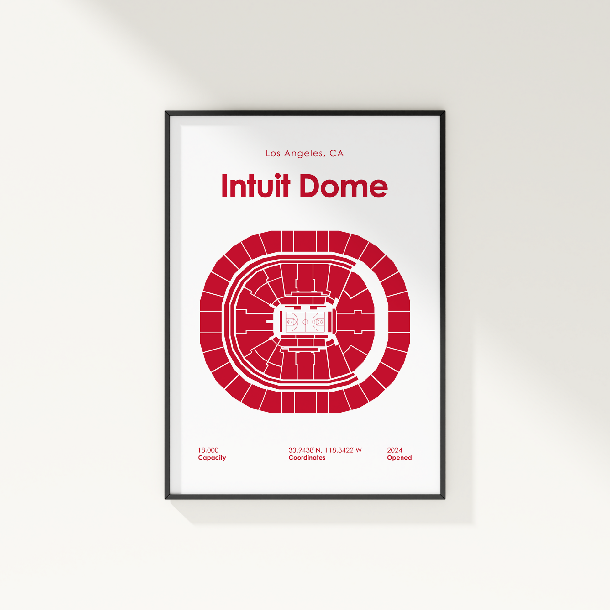 Framed poster of Intuit Dome with red seating chart and white text on a light gray background