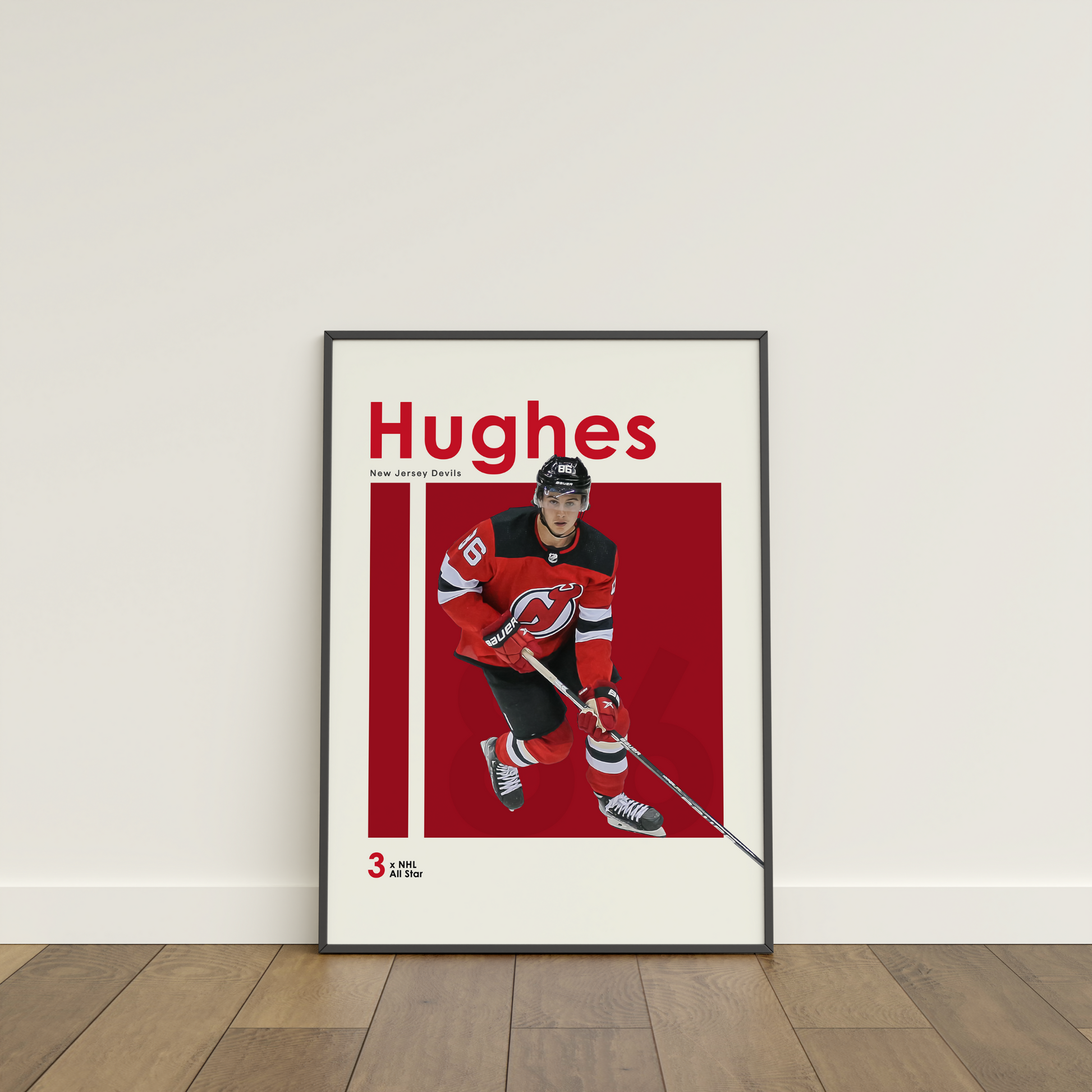 framed poster mockup of hockey player jack hughes leaning on a white wall