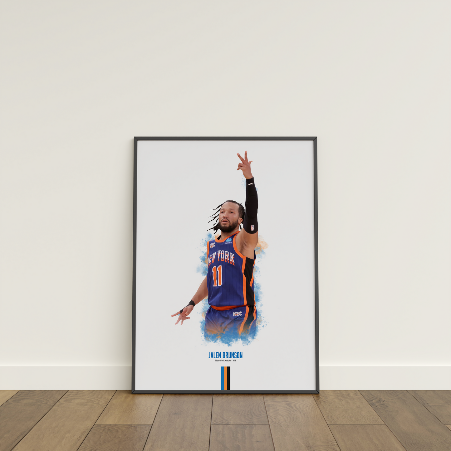 framed poster mockup of basketball player jalen brunson leaning on a white wall