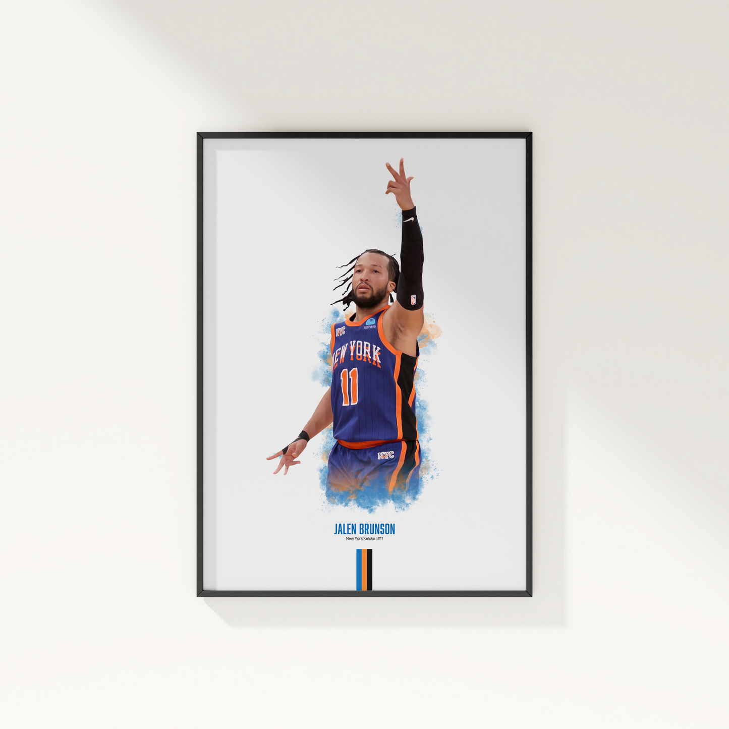 framed poster mockup of basketball player jalen brunson hanging on a white wall