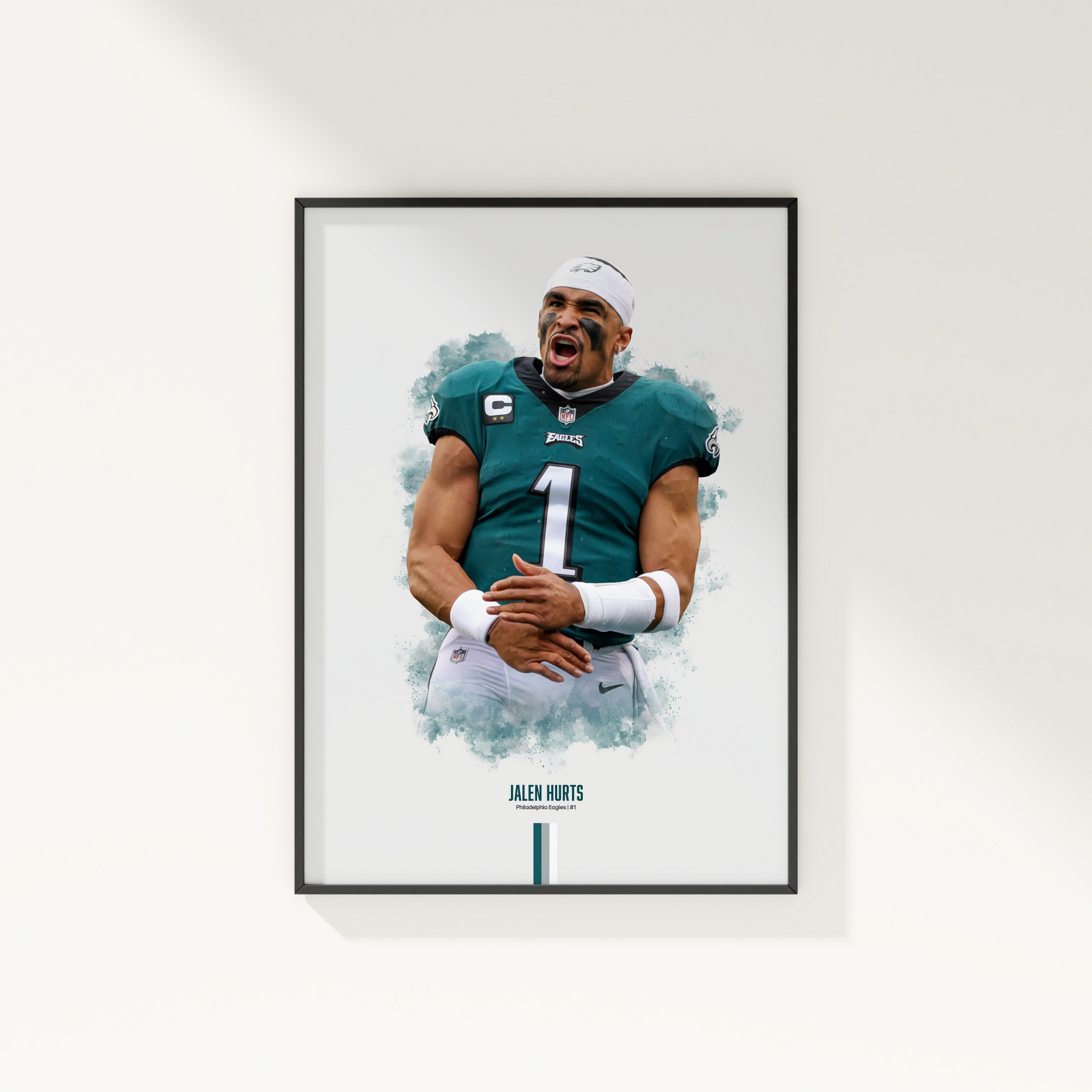 framed poster mockup of football player jalen hurts hanging on a white wall