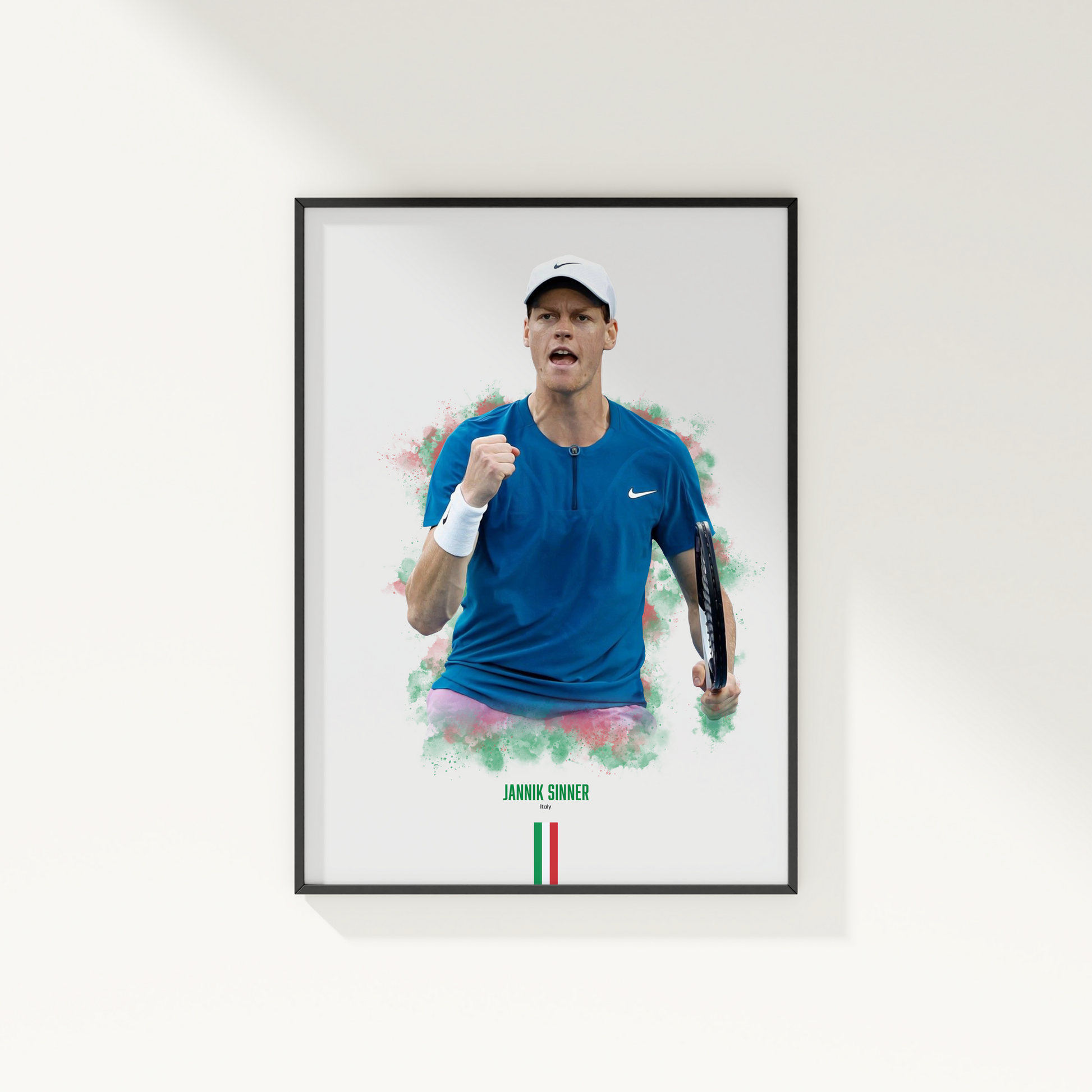 framed poster mockup of tennis player jannik sinner hanging on a white wall