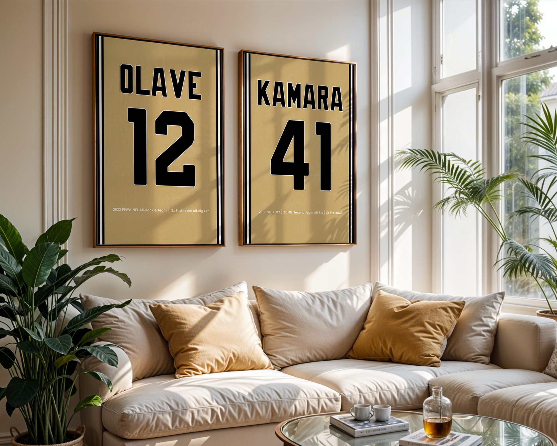 Living room with a beige sofa, decorative pillows, and framed numbers on the wall.