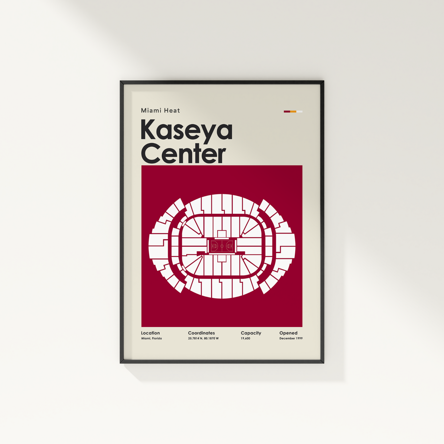 Framed poster of Kaseya Center layout with Miami Heat branding on a white wall.