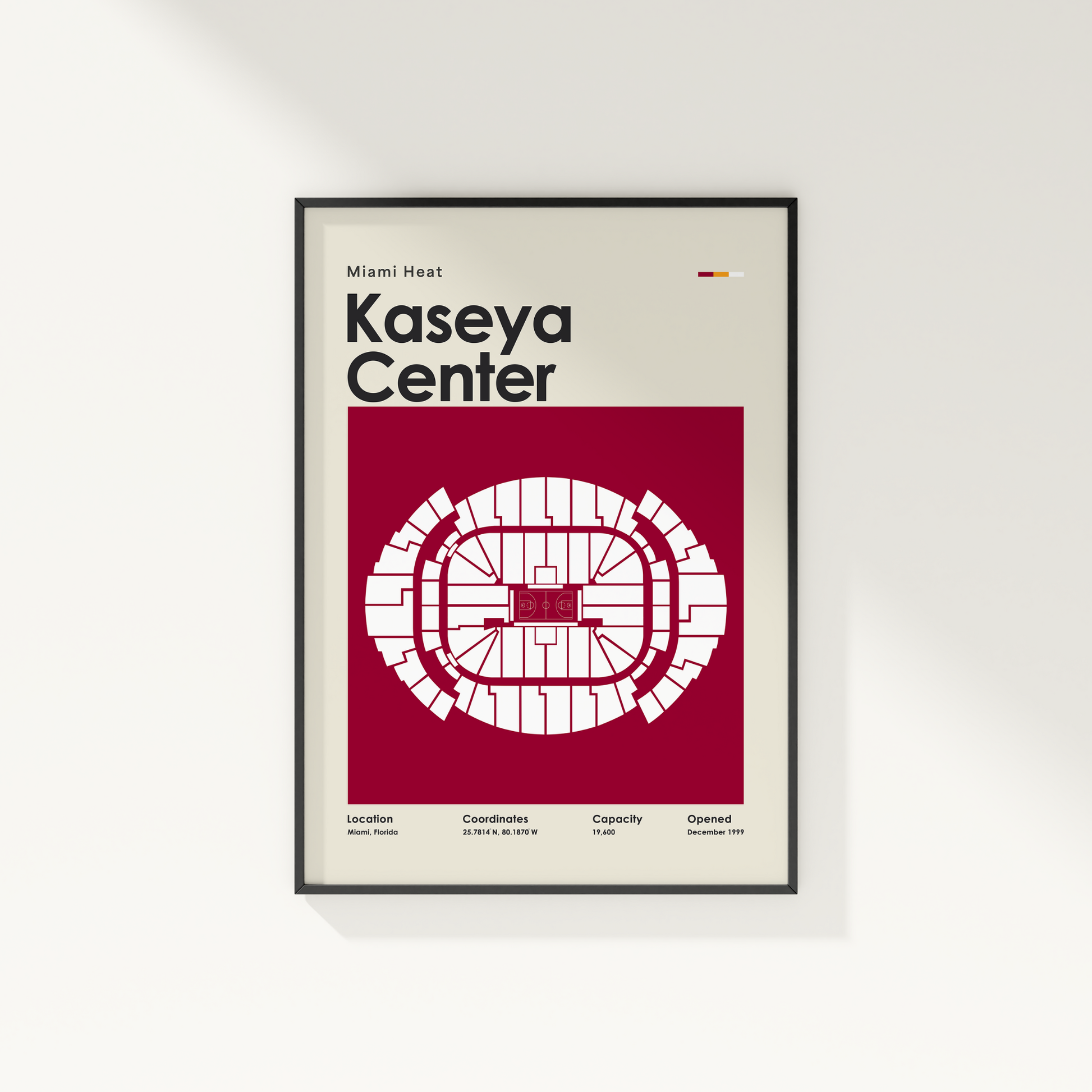 Framed poster of Kaseya Center layout with Miami Heat branding on a white wall.