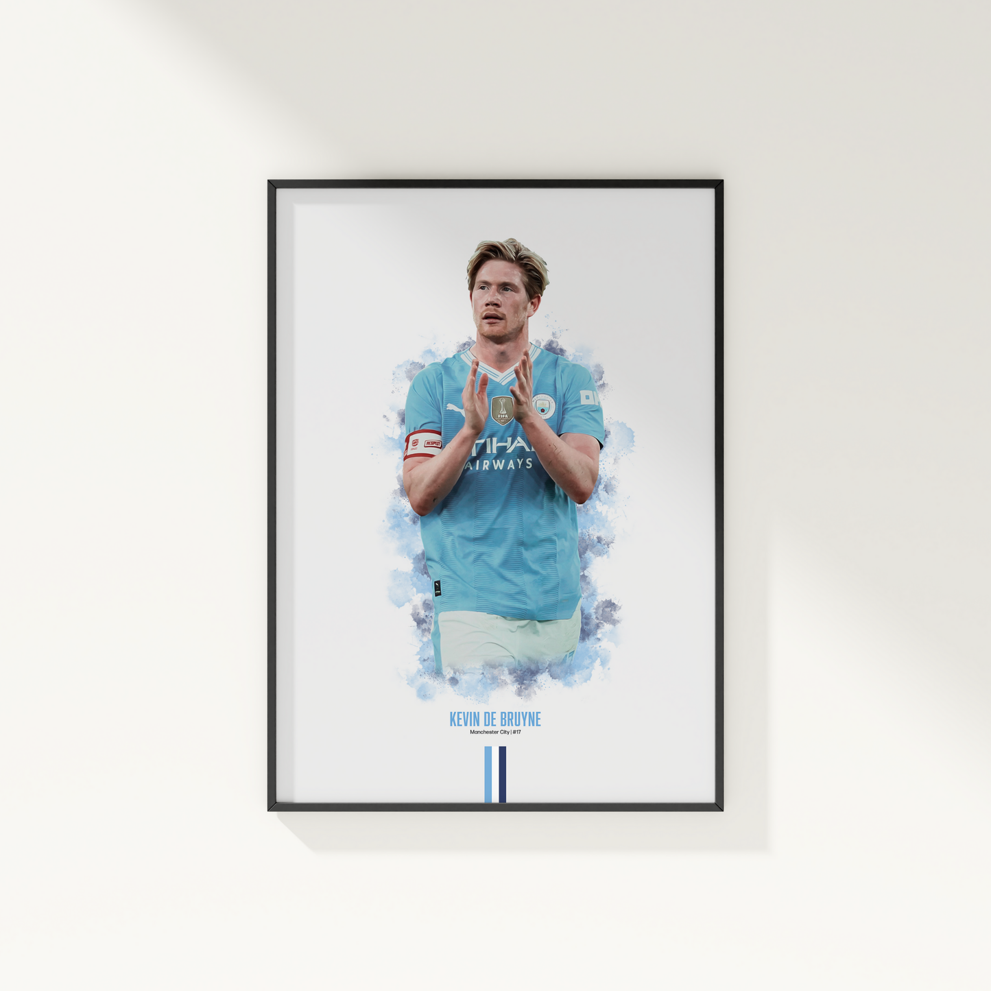 framed poster mockup of soccer player kevin de bruyne hanging on a white wall