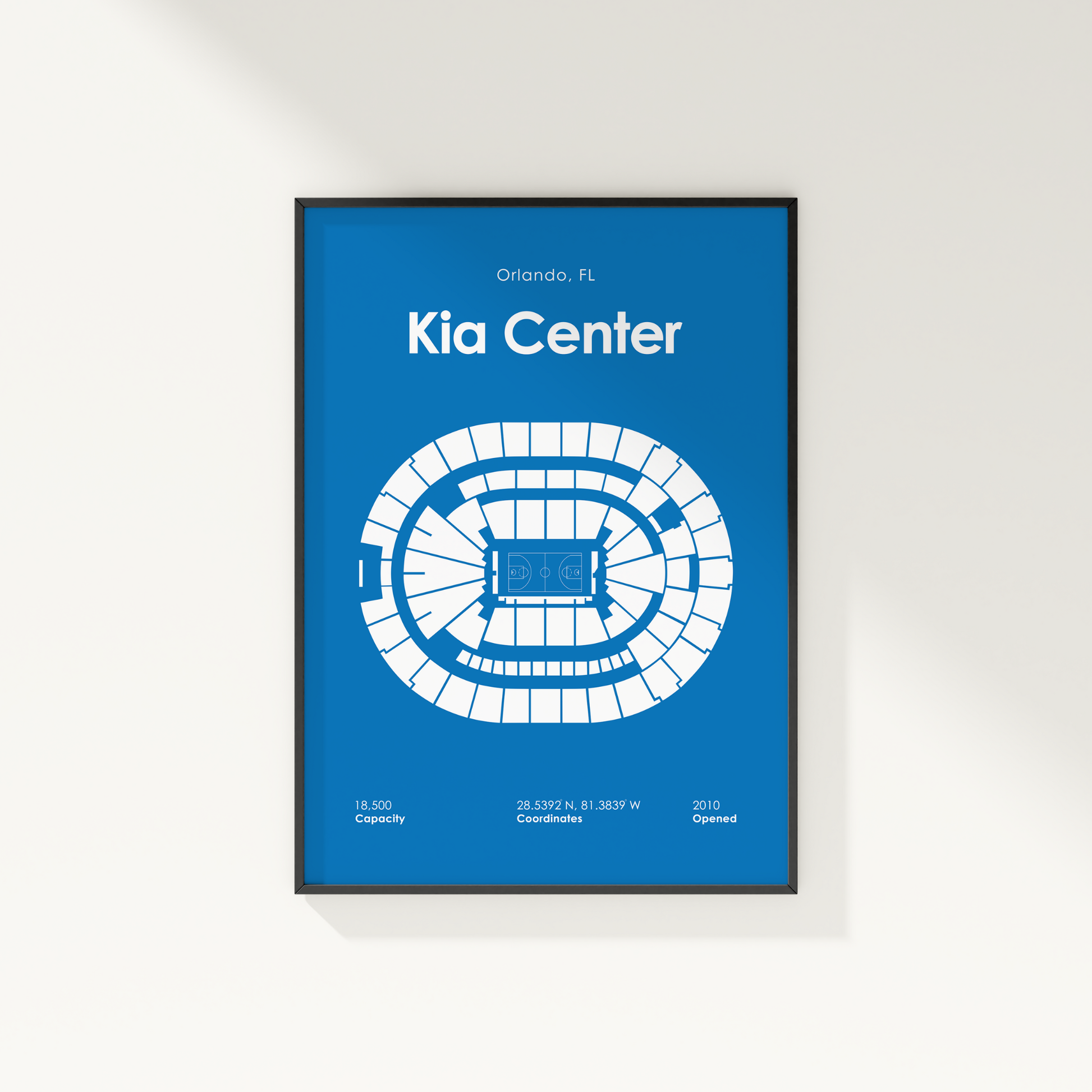 Framed poster of the Kia Center layout with blue background and white text.