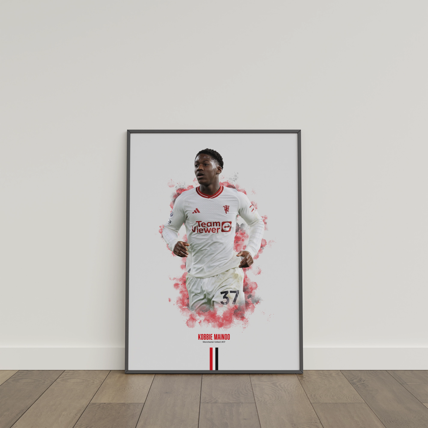 framed poster mockup of soccer player kobbie mainoo leaning on a white wall