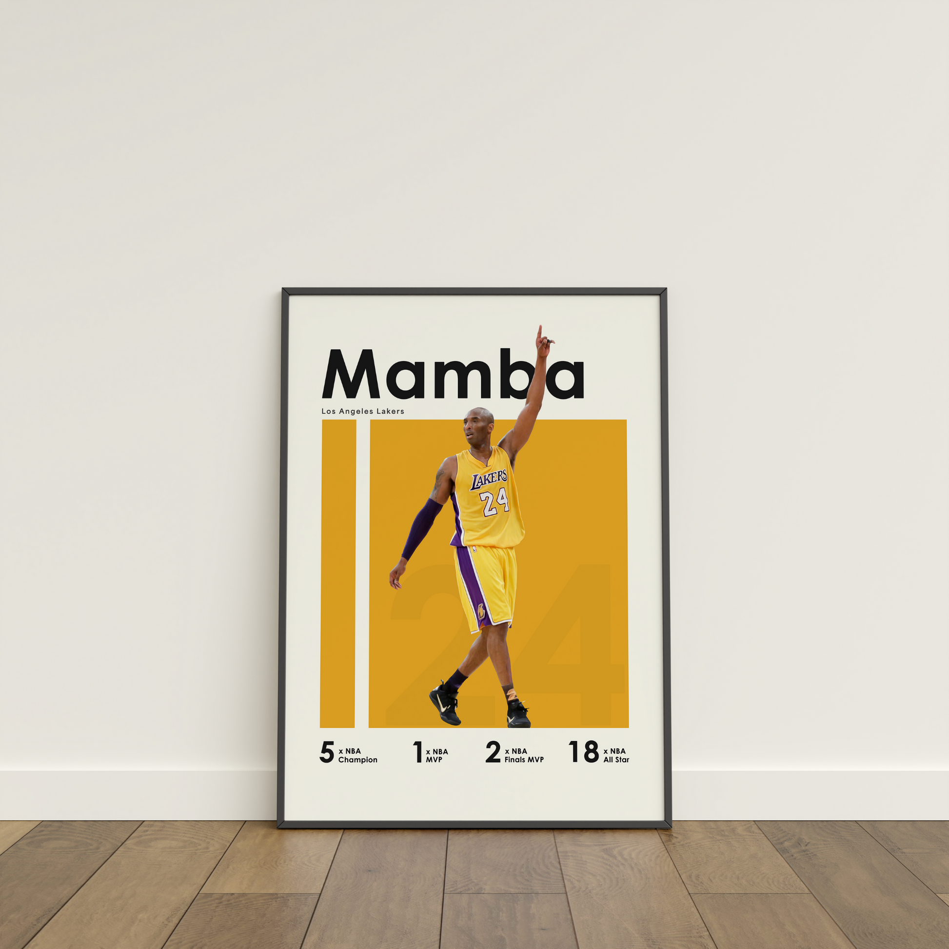 framed poster mockup of basketball player kobe bryant leaning on a white wall