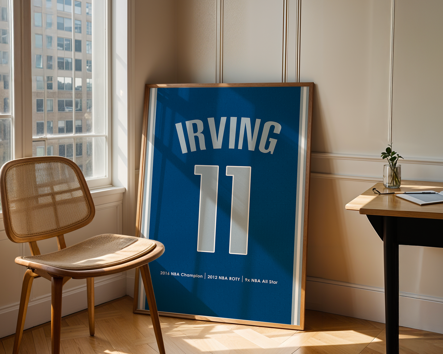 Framed sports jersey with 'Irving 11' in a room with a window and chair.