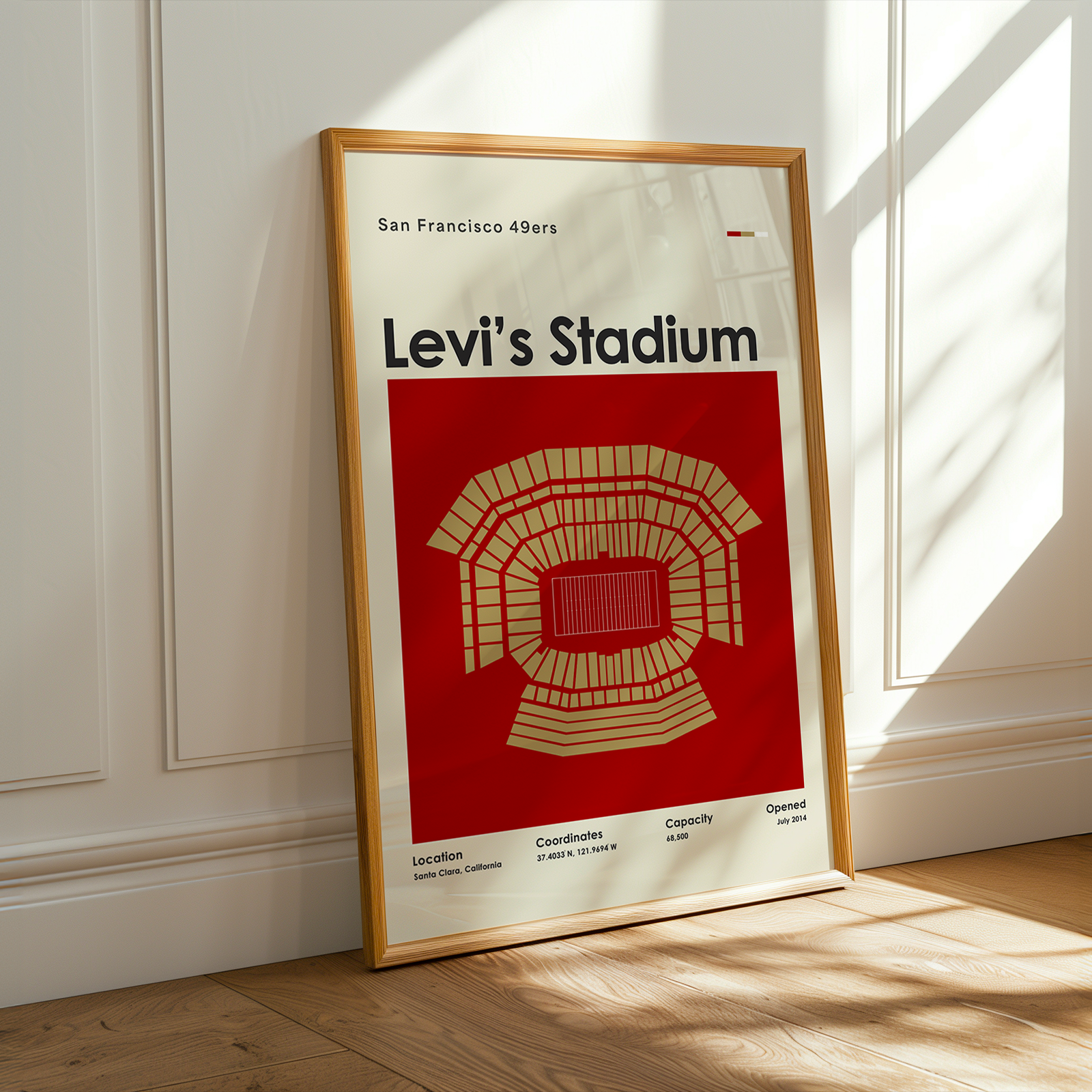 Framed poster of Levi's Stadium with 'San Francisco 49ers' text on a white wall.