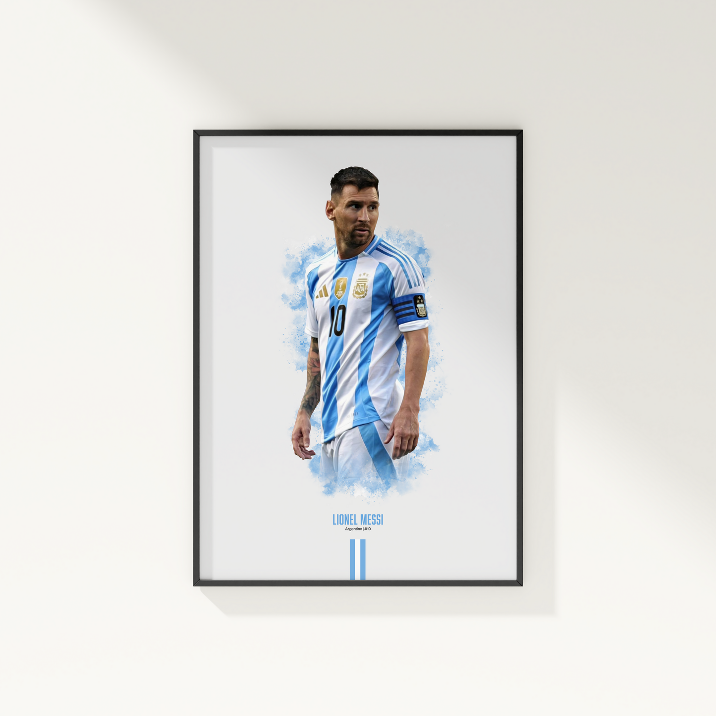 framed poster mockup of soccer player lionel messi hanging on a white wall