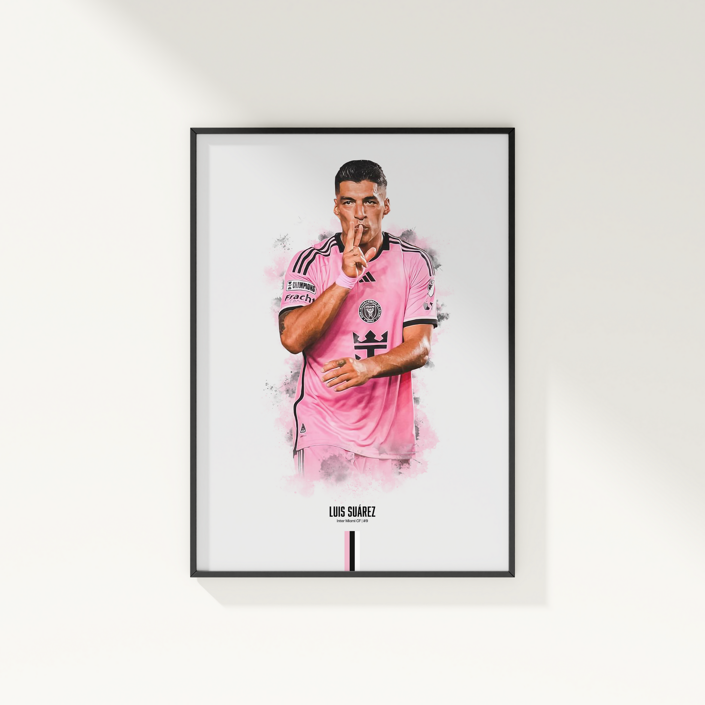 framed poster mockup of soccer player luis suarez hanging on a white wall